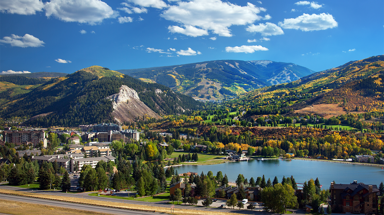Aerial view of Marriott Vacation Club destination in Aspen, Colorado in a valley beside a small lake