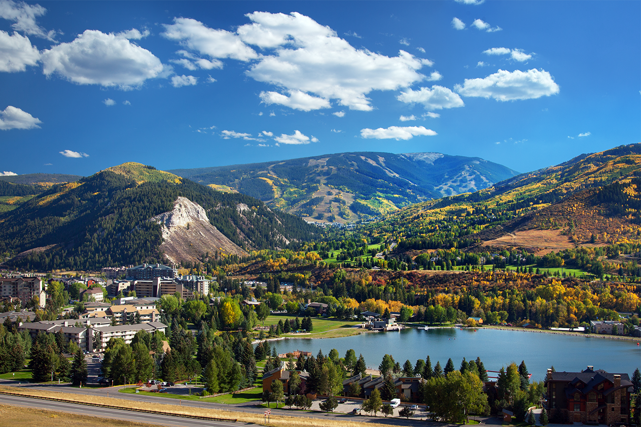 Aerial view of Marriott Vacation Club destination in Aspen, Colorado in a valley beside a small lake