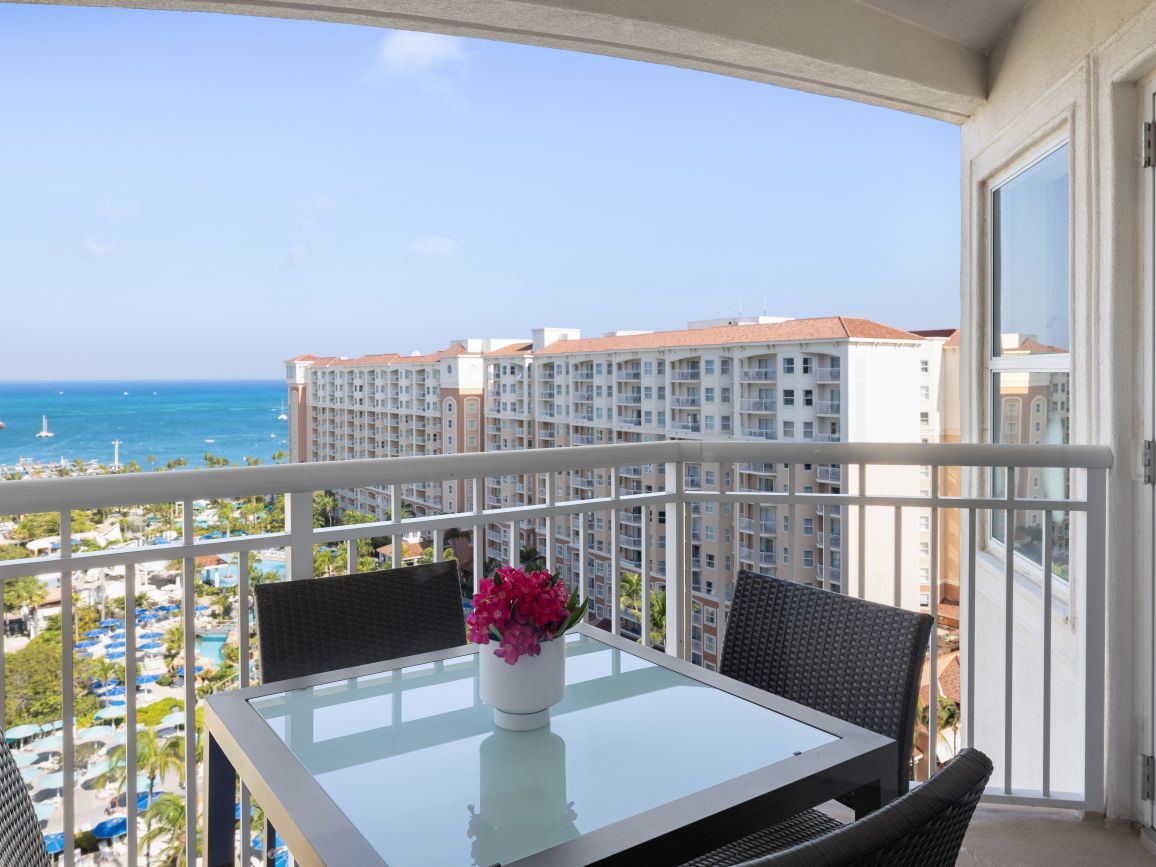 ac-one-or-two-bedroom-villa-ocean-balcony-interior-photo