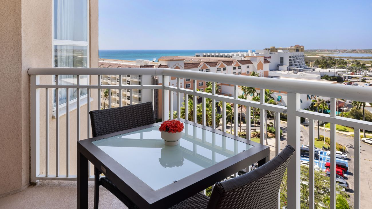 ac-three-bedroom-villa,-guest-balcony,-interior-photo