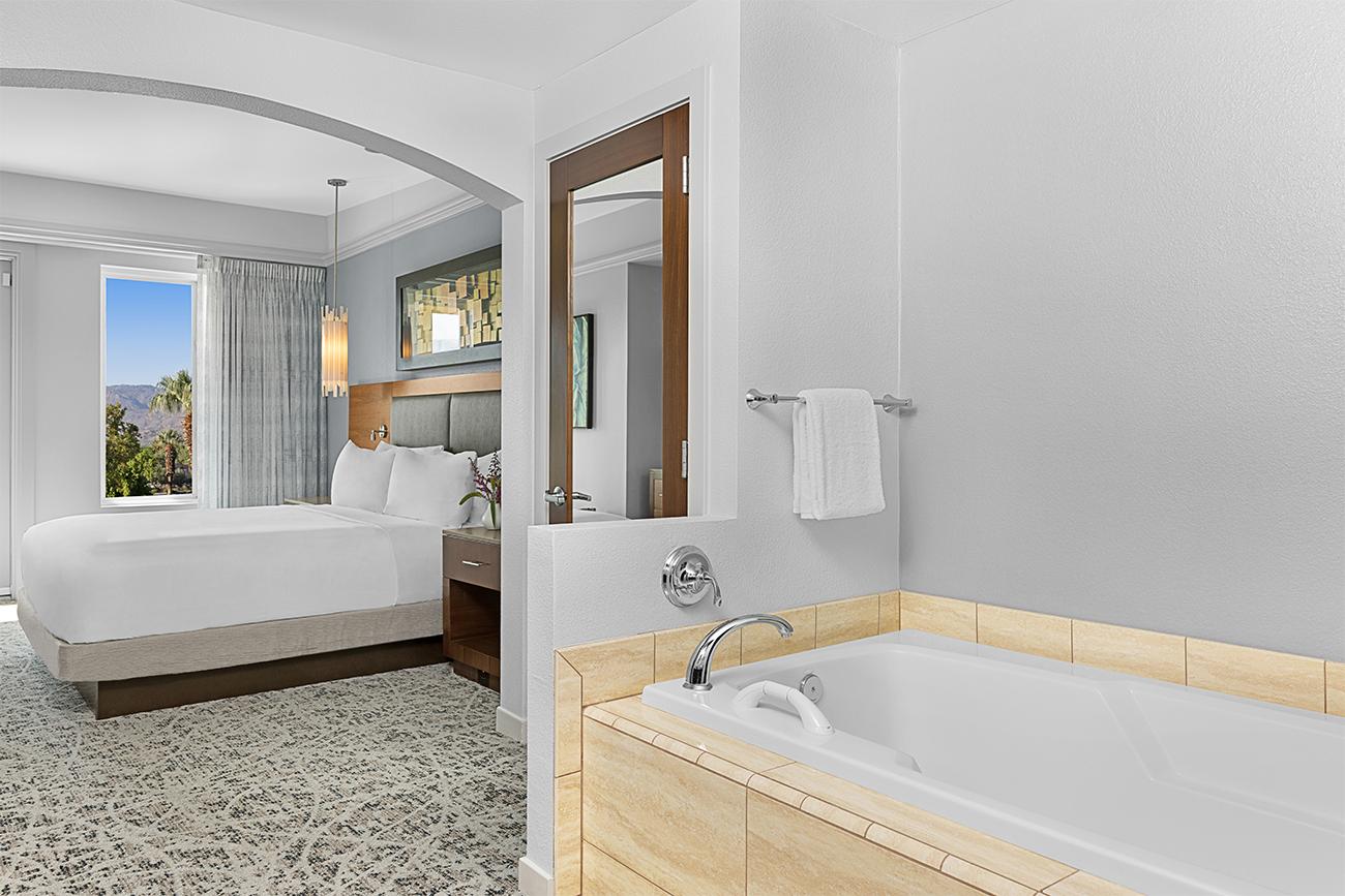 ds-one-and-two-bedroom-primary-bedroom-with-tub-interior-photo