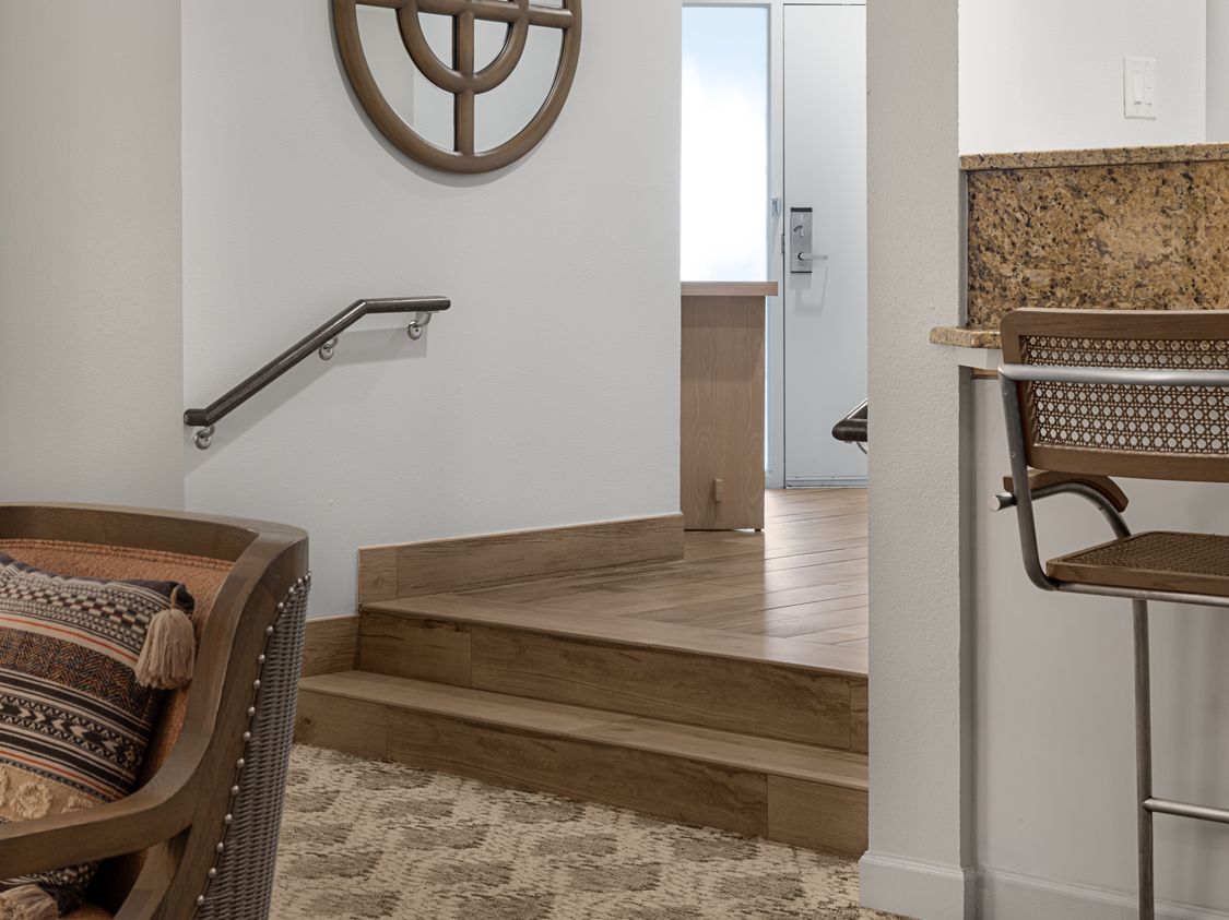 sa-two-bedroom-villa-living-room-to-kitchen-stairs-interior-photo