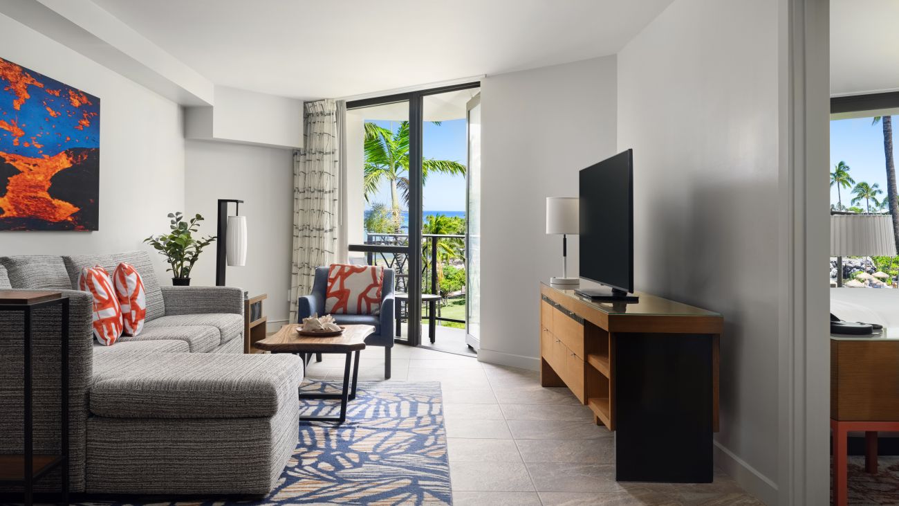 wk-two-bedroom-living-room-pool-view-interior-photo