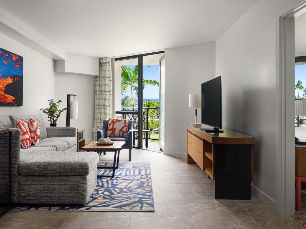 wk-two-bedroom-living-room-pool-view-interior-photo