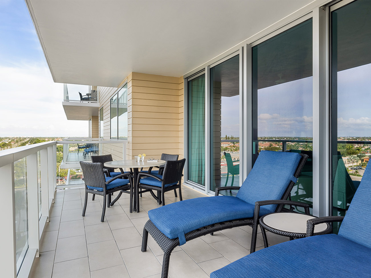 za-two-three-bed-island-view-balcony-interior-photo