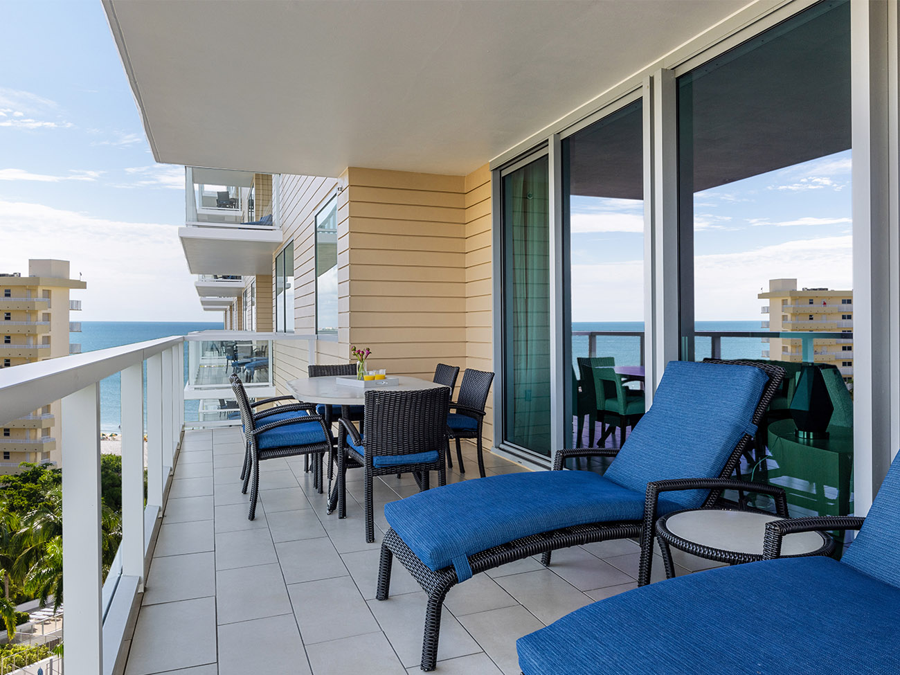 za-two-three-bed-poolside-lower-balcony-interior-photo