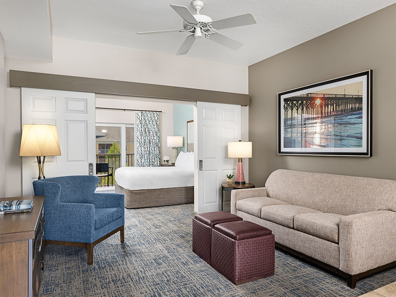 sbp-palmetto-one-bedroom-two-bedroom-lockoff-three-bedroom-lockoff-bedroom-and-living-area-interior-photo