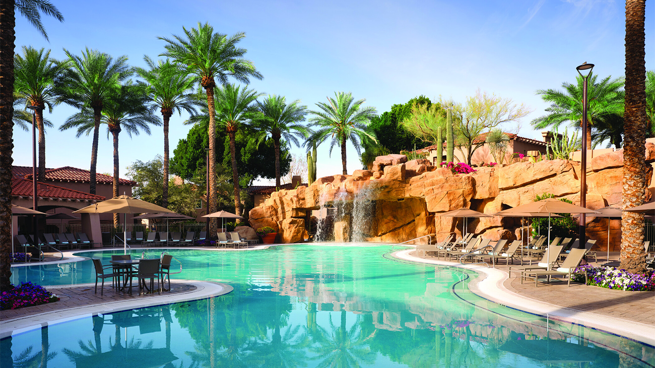 Pool grotto lined with rock waterfalls at the Sheraton Desert Oasis resort timeshare