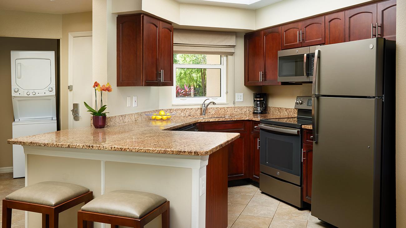 Kitchen With Washer and Dryer