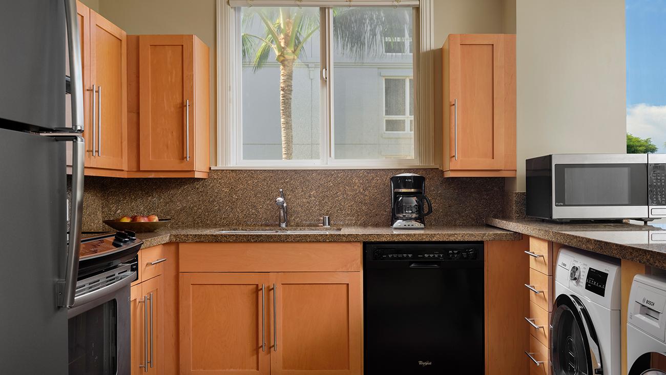 Kitchen With Washer and Dryer