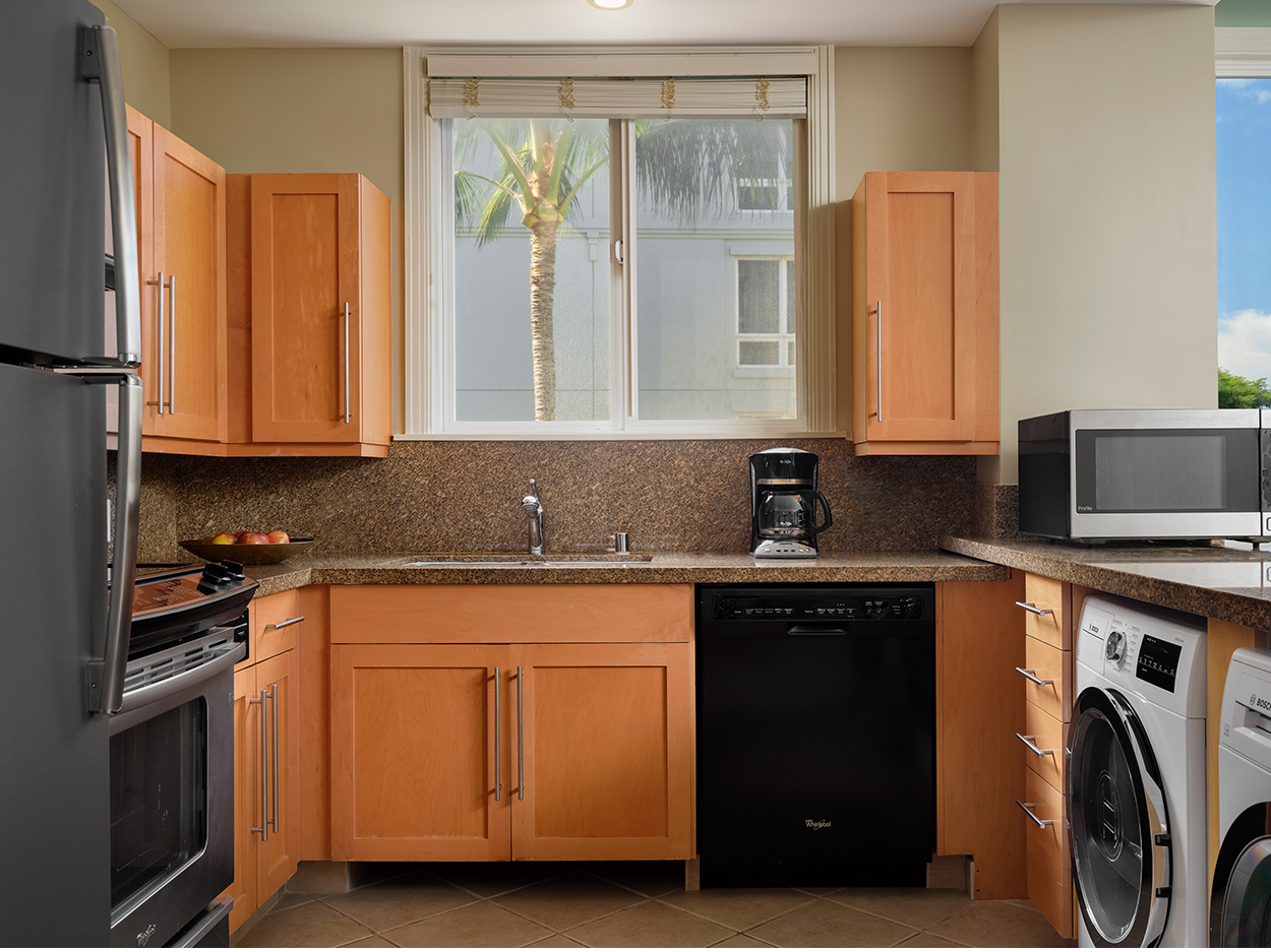 Kitchen With Washer and Dryer