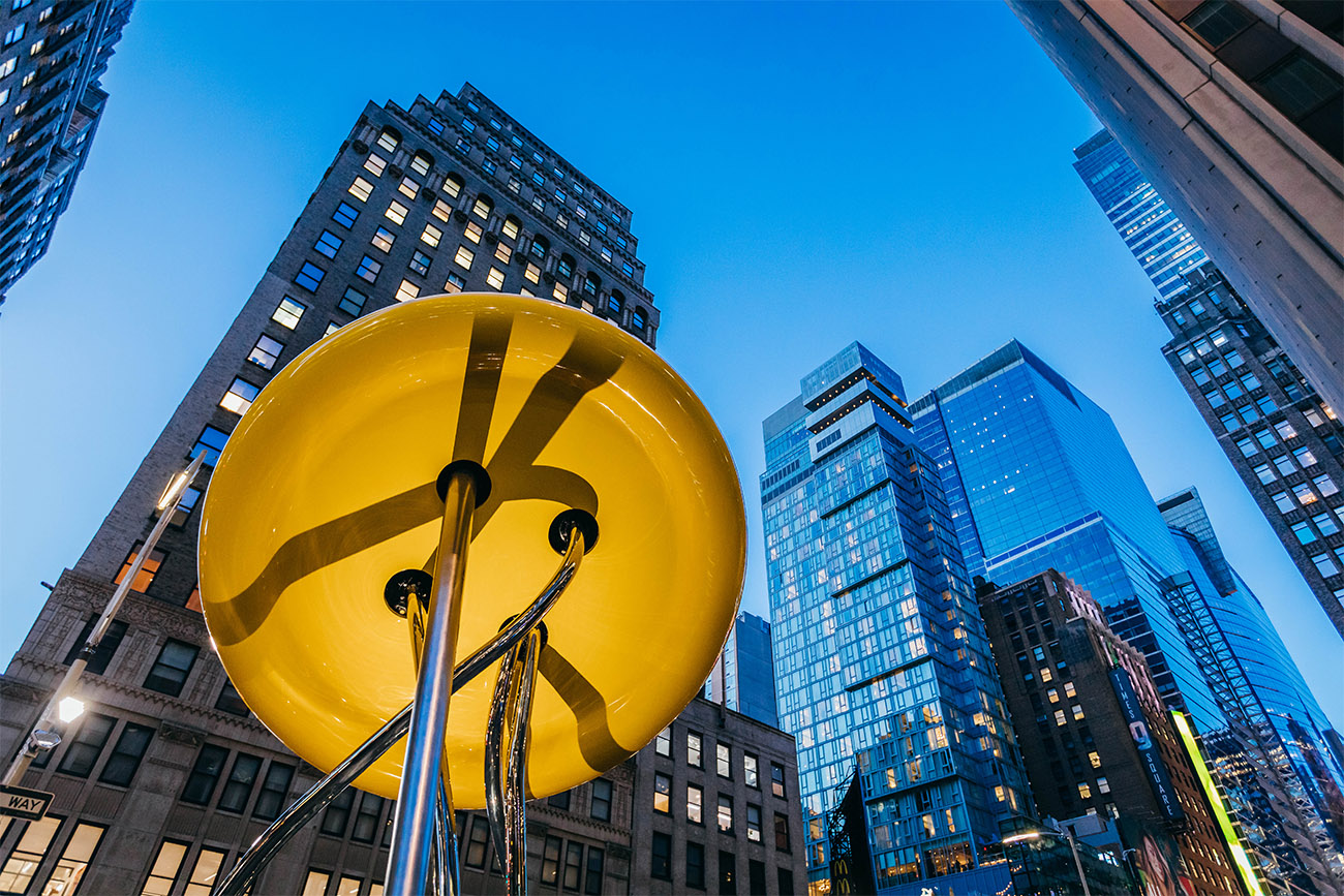 New York’s Big Button shines as the sun goes down