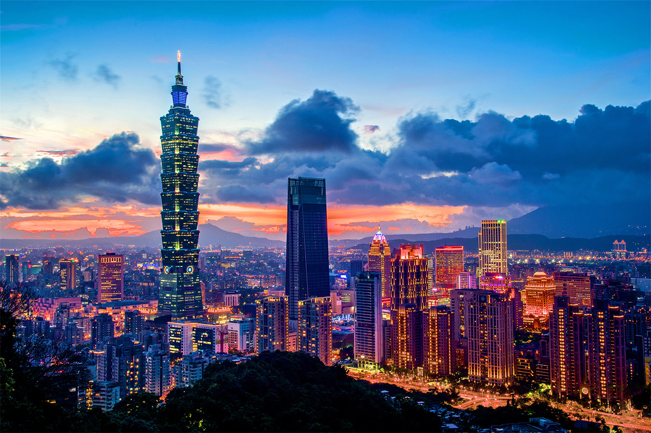 The Taipei skyline stands out as the sun sets