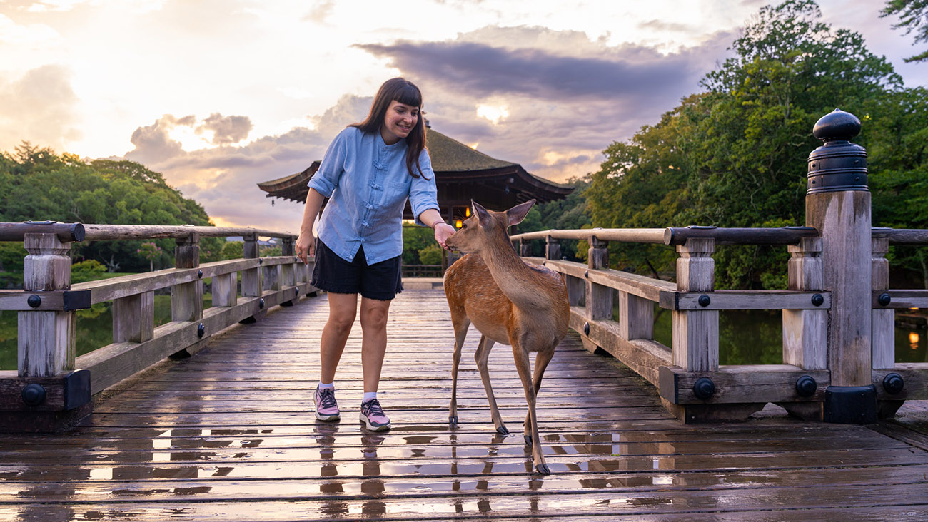 Woman with a deer in Nara, Japan