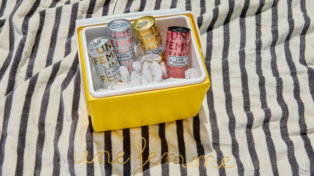Can of Une Femme in a cooler