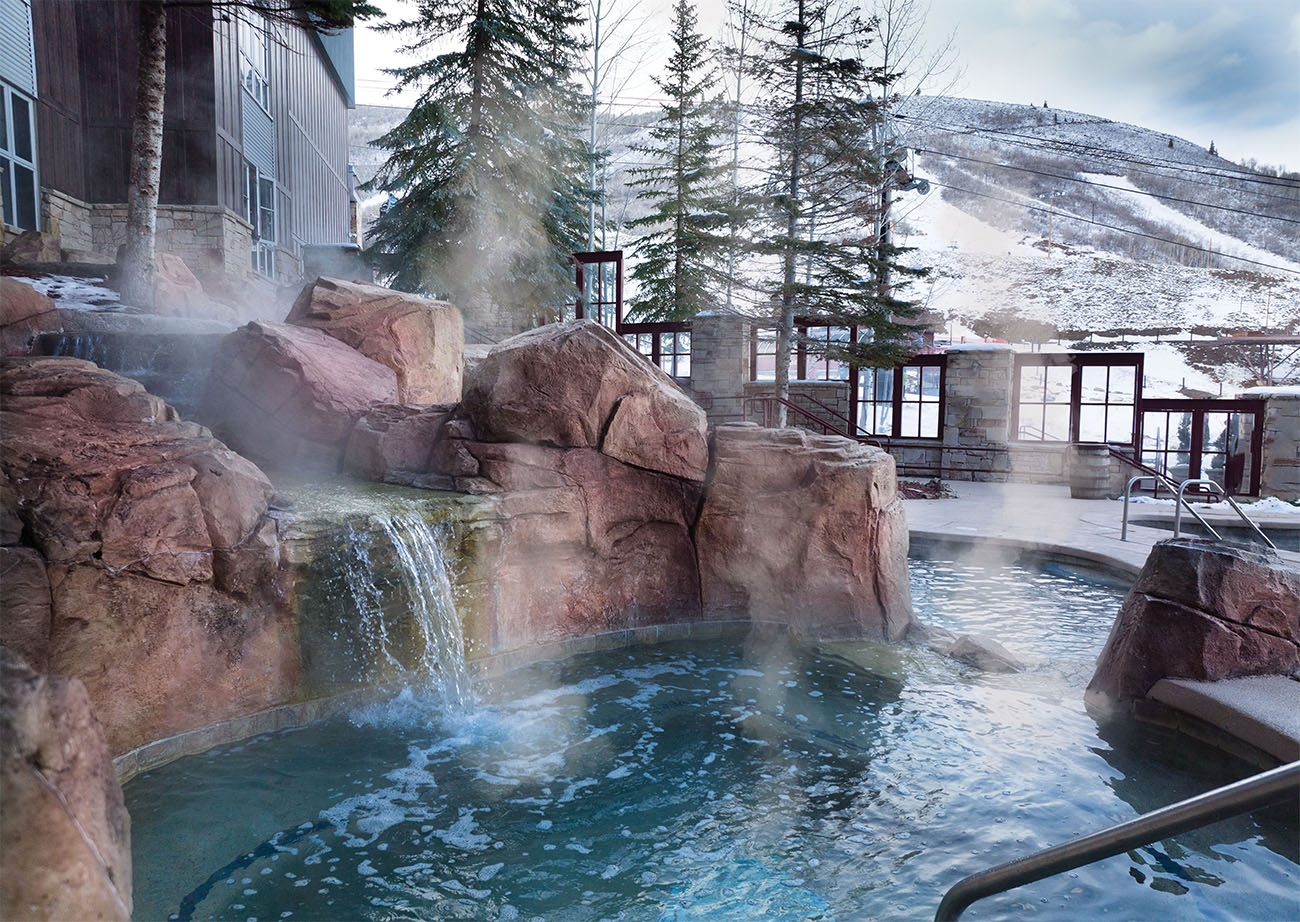 Marriott’s MountainSide Resort borders a snowy mountain under the sun.