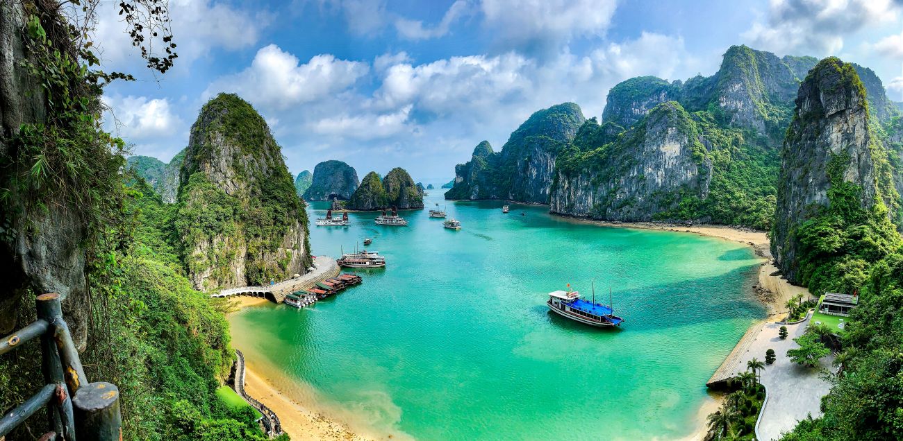 Limestone islands and turquoise waters in Ha Long Bay, Vietnam.