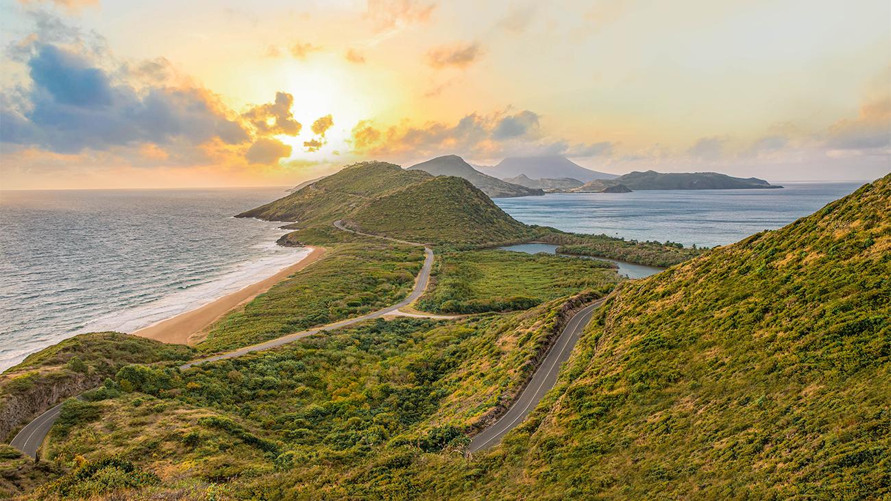 Aerial of a promontory with mountains in the background at Timothy Hill, Saint Kitts, a Marriott Vacation Club destination